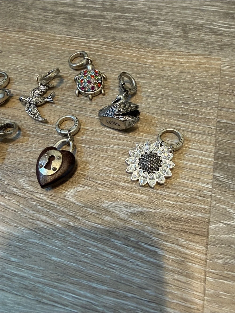 Fossil Silver Tone Adjustable Charm Bracelet 8 Charms Retired Rare
